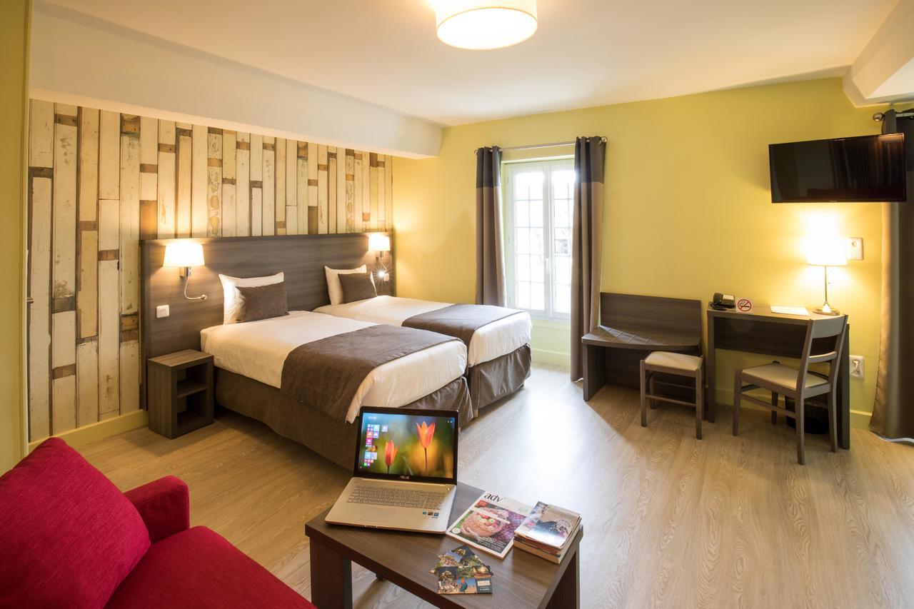 Logis Hotel Restaurant De La Poste Le Mele-sur-Sarthe ภายนอก รูปภาพ